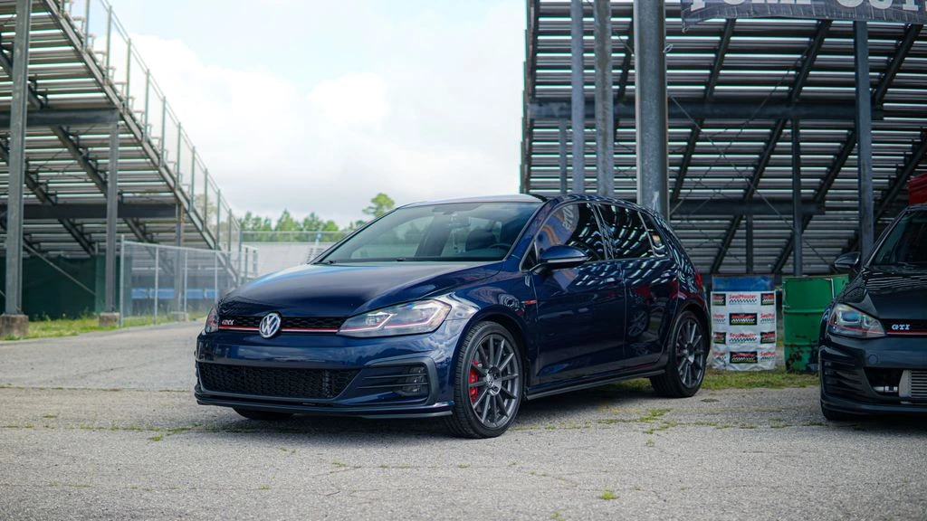 A 2019 Volkswagen Golf R strapped to a Dynapack dynamometer for a third-gear pull.