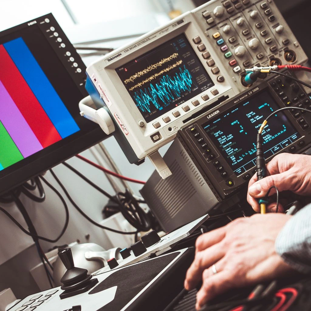 Calibrator reviewing a torque curve on dual monitors